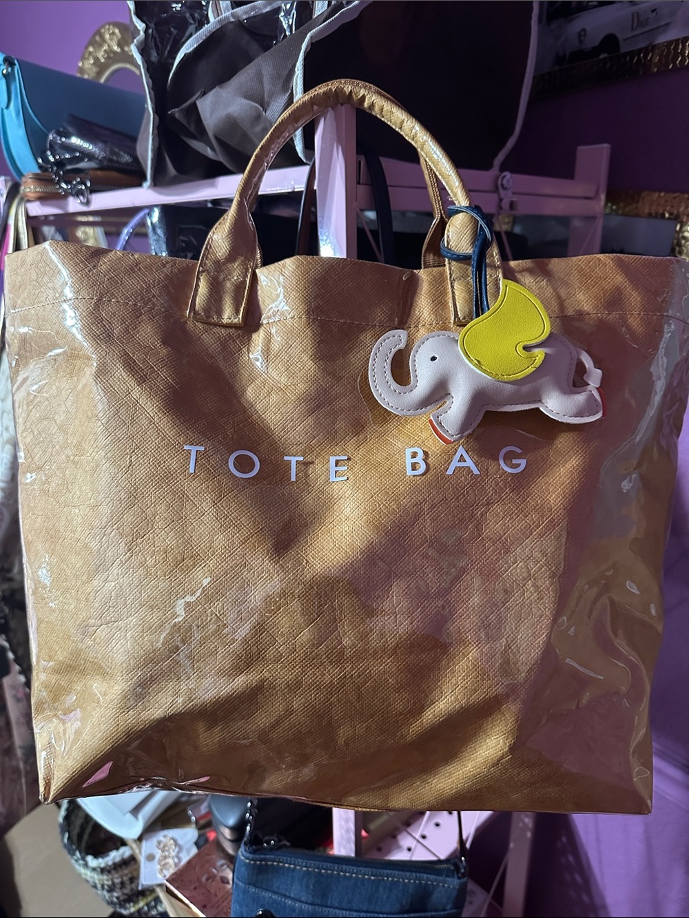 Stylish Tan Tote Bag with charm NWOT